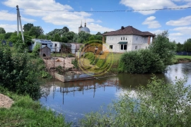 Продается дом 255м с личным водоёмом 1га